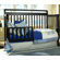 DaVinci Emily 4-in-1 Convertible Crib with Toddler Rail in Ebony Black