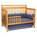 DaVinci Emily 4-in-1 Convertible Crib with Toddler Rail in Honey Oak