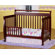 DaVinci Emily 4-in-1 Convertible Crib with Toddler Rail in Cherry