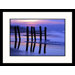 Wood Pylons and Ocean Framed Photograph