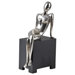 Non Chalant Statue