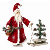 Santa with Tree on Sled Figurine